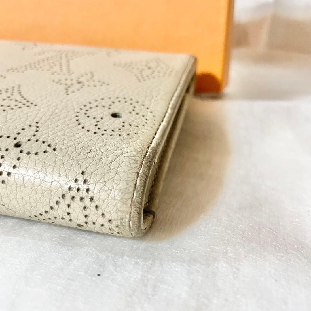 【至高の逸品】LOUIS VUITTONマヒナポルトフォイユアメリア三つ折り財布