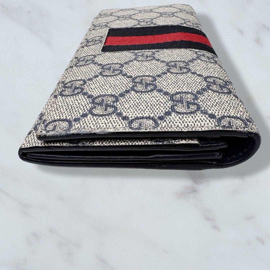 09 GUCCI PVC 二つ折り財布 長財布 シェリーライン k8