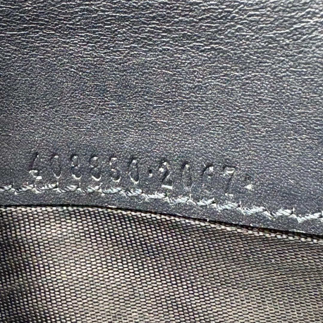 09 GUCCI PVC 二つ折り財布 長財布 シェリーライン k8