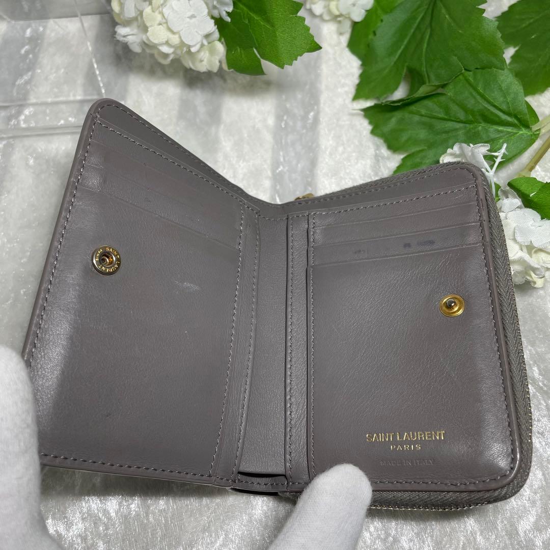 サンローラン 二つ折り財布 ラウンドジップ カサンドラ グレー YSL