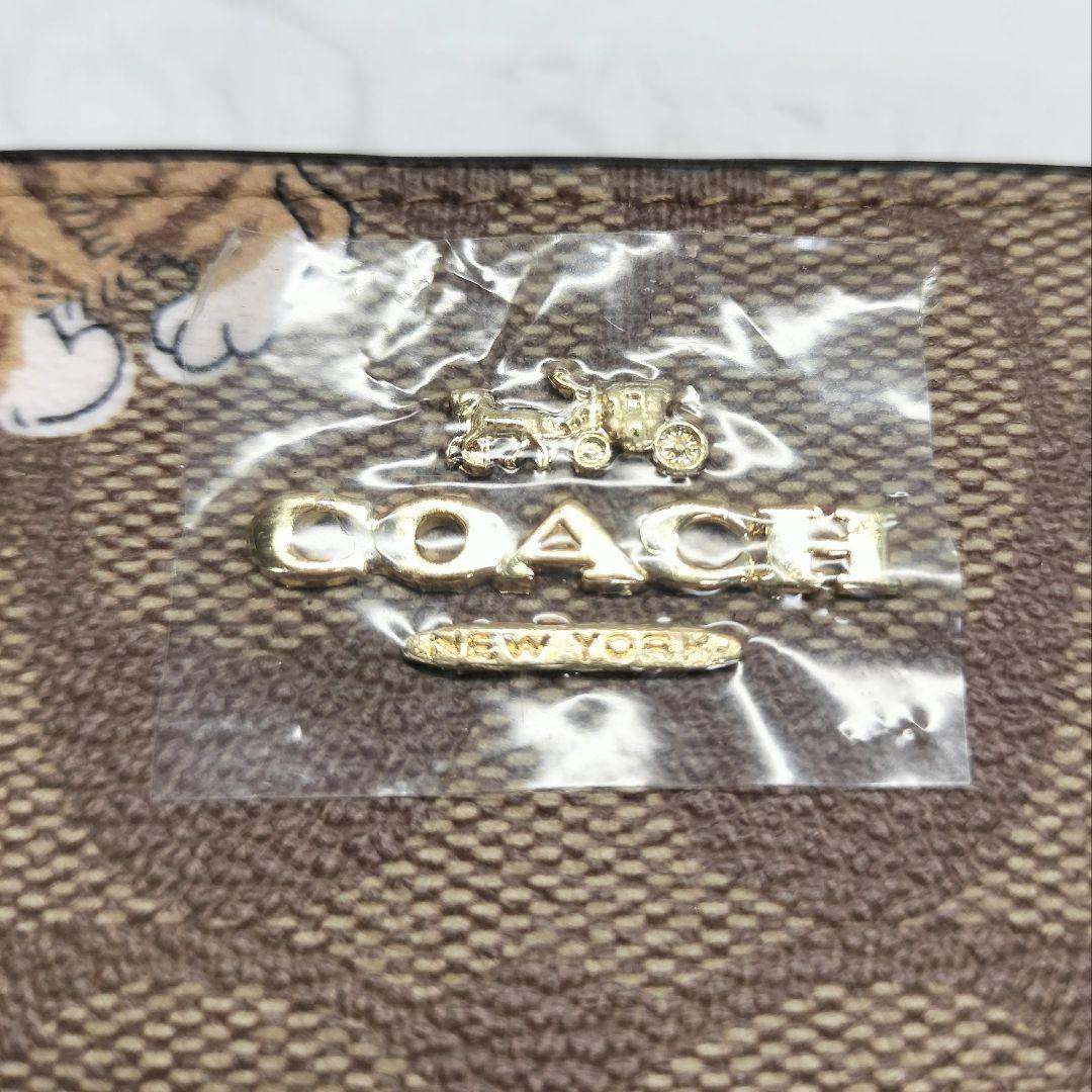 【新品・未使用】COACH 猫のイラスト 二つ折り財布