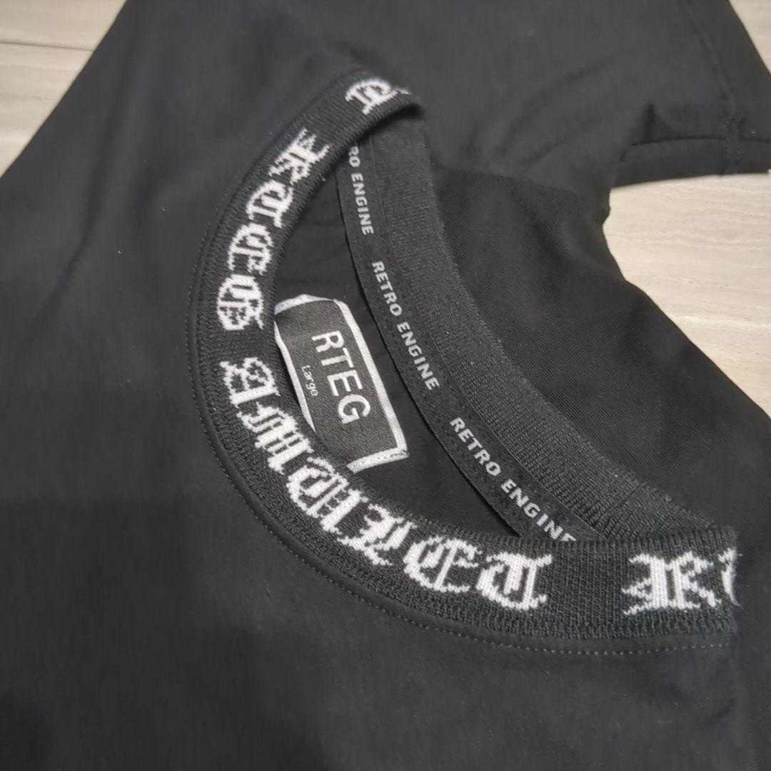 アダムスジャグラー ブラック Tシャツ