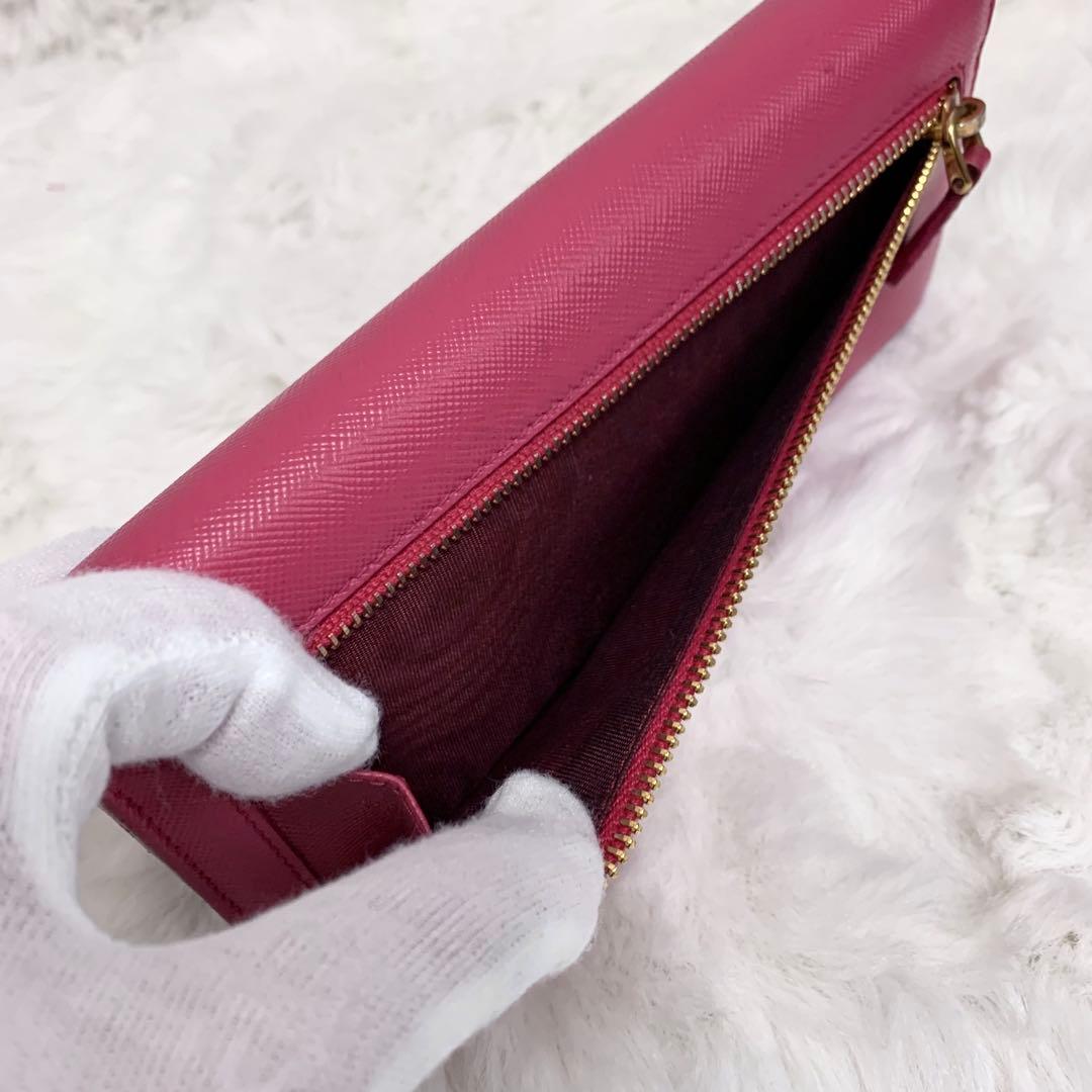 良品！PRADA サフィアーノ　メタルロゴ　ピンク系　レディース　長財布