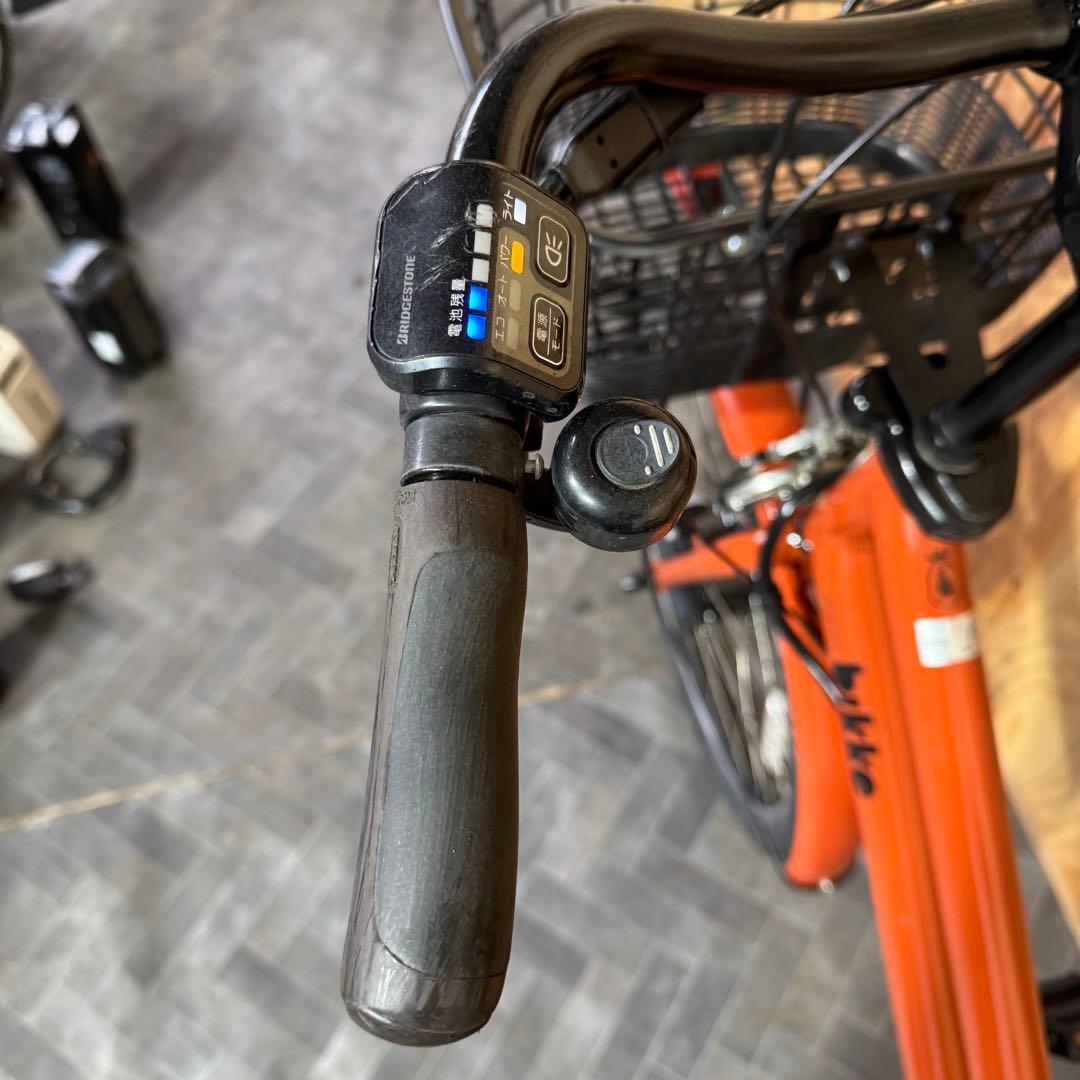オレンジ色 電動アシスト自転車 シティタイプ