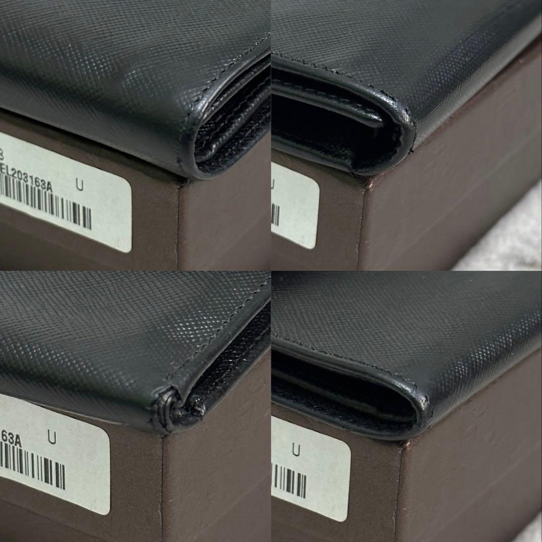 PRADA プラダ　折り財布　ロゴ金具　ブラック　サフィアーノレザー