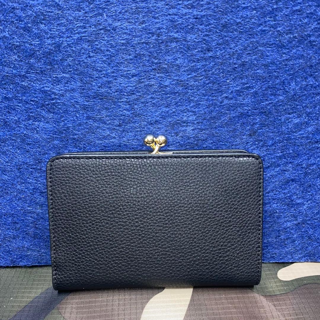 COACHコーチキュロスレザーがま口財布二つ折り財布