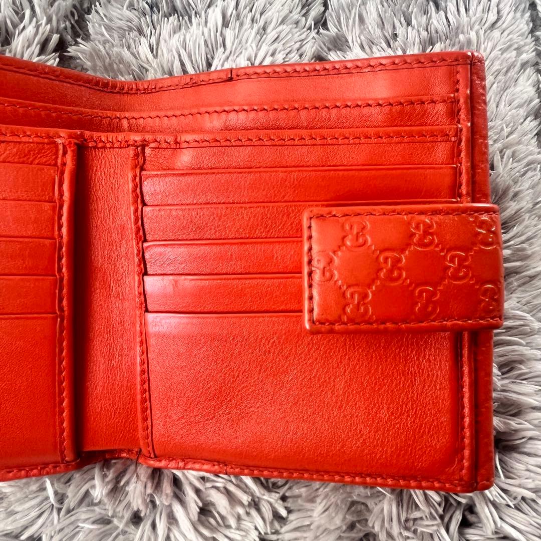 美品✨GUCCI マイクロシマ　折り財布　オレンジ　ロゴプレート　Wホック