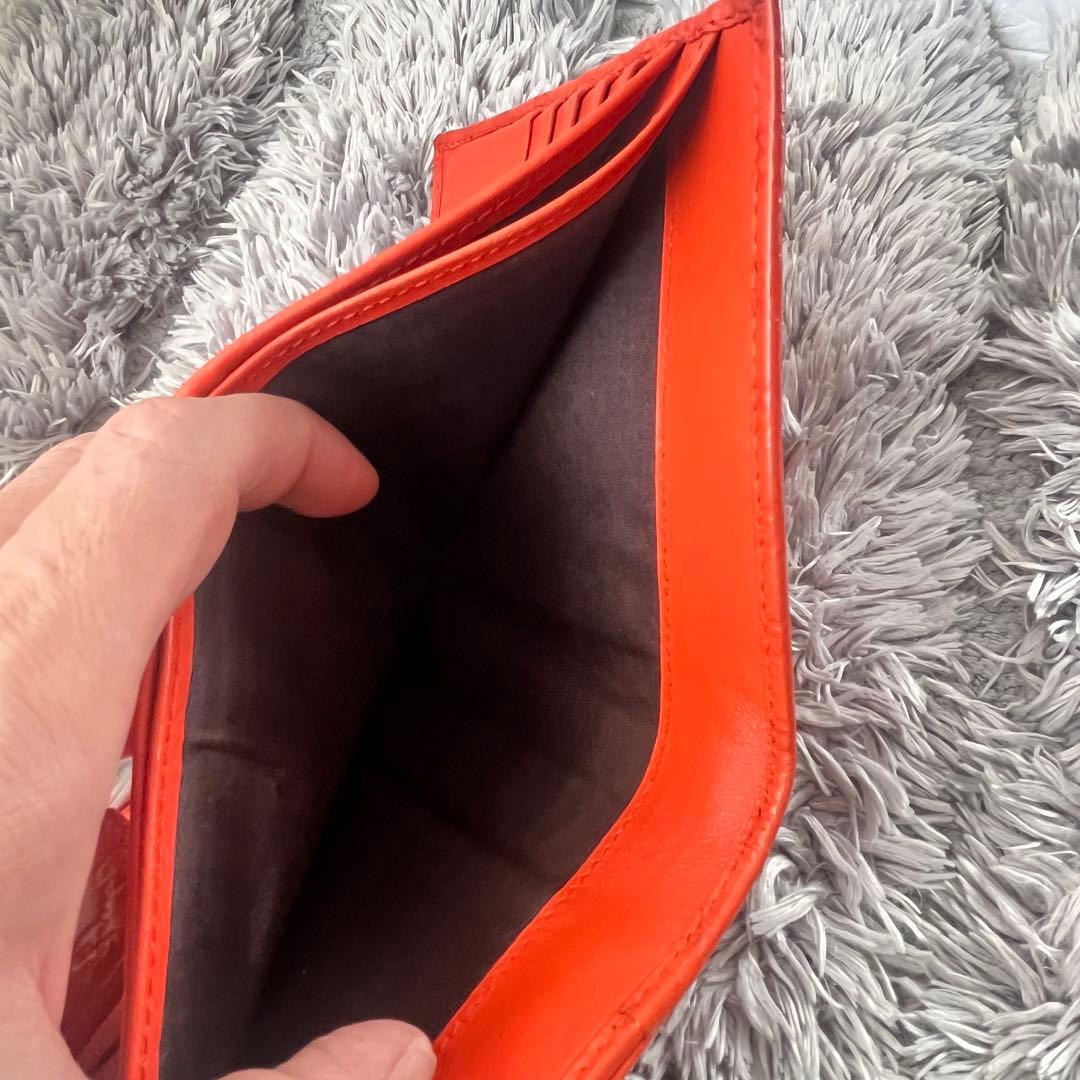 美品✨GUCCI マイクロシマ　折り財布　オレンジ　ロゴプレート　Wホック