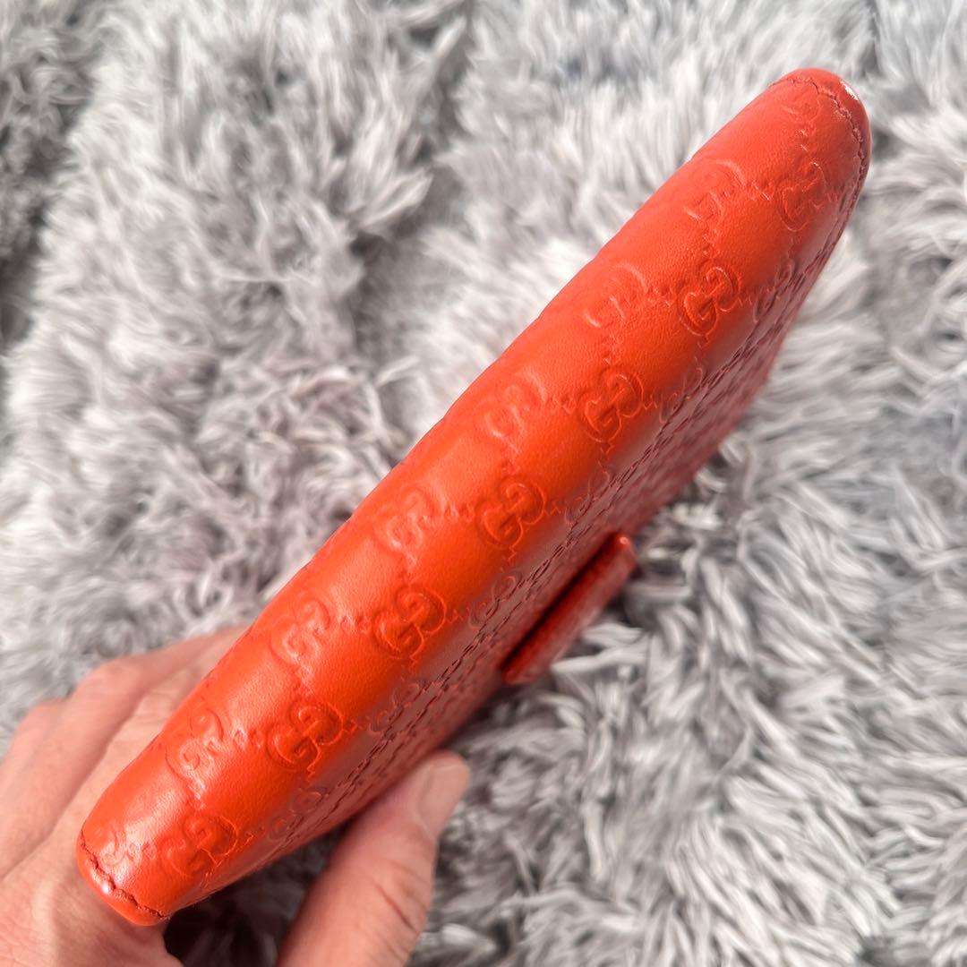美品✨GUCCI マイクロシマ　折り財布　オレンジ　ロゴプレート　Wホック