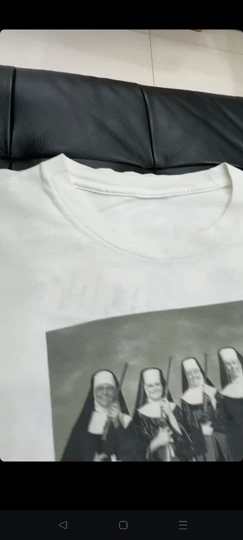 トップス RAGE AGAINST THE MACHINE NUNS AND GUNS T