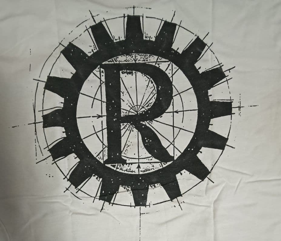 トップス RAGE AGAINST THE MACHINE NUNS AND GUNS T