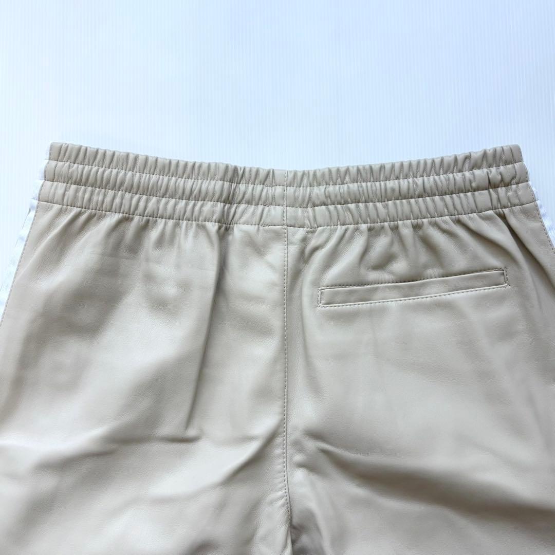 新品　adidas フェイクレザー ファイヤーバード トラックパンツ Lベージュ
