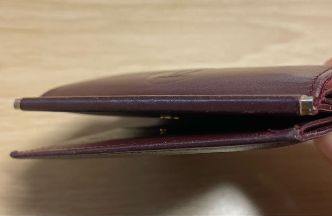 Cartier バーガンディ 二つ折り財布